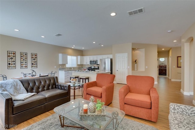 10243 Songsparrow Ct, Las Vegas, NV 89135 - living area featuring light wood finished floors and recessed lighting