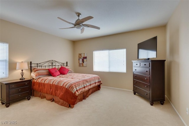 10243 Songsparrow Ct, Las Vegas, NV 89135 - bedroom with multiple windows, light colored carpet, and a ceiling fan