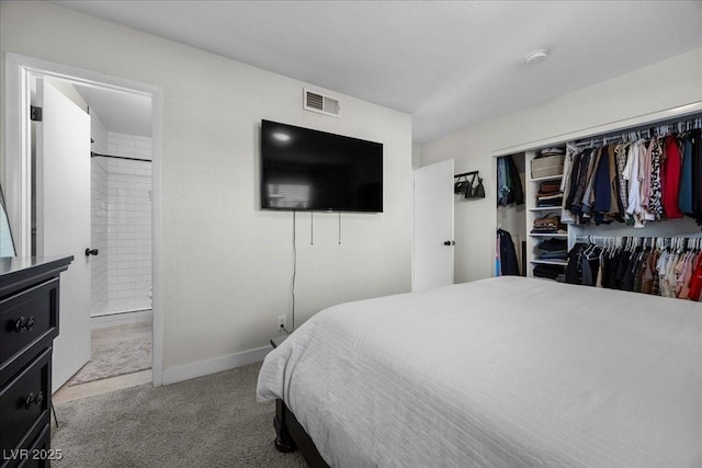2088 Miner Way, Las Vegas, NV 89104 - carpeted bedroom featuring a closet and connected bathroom