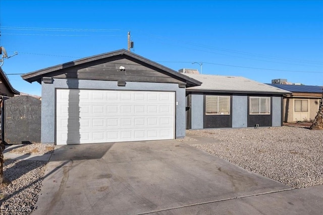 2088 Miner Way, Las Vegas, NV 89104 - ranch-style house featuring driveway, an attached garage, and stucco siding