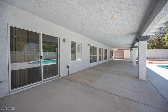9728 Drumcannon Ave, Las Vegas, NV 89129 - fenced backyard with a patio