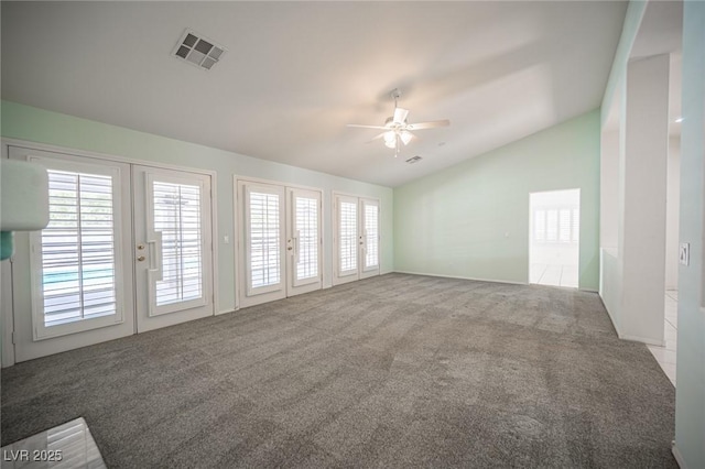 9728 Drumcannon Ave, Las Vegas, NV 89129 - carpeted spare room featuring lofted ceiling, ceiling fan, healthy amount of natural light, and french doors