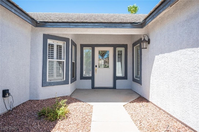 9728 Drumcannon Ave, Las Vegas, NV 89129 - doorway to property featuring stucco siding