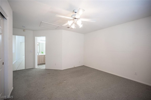 9728 Drumcannon Ave, Las Vegas, NV 89129 - unfurnished room featuring light carpet, a ceiling fan, and attic access