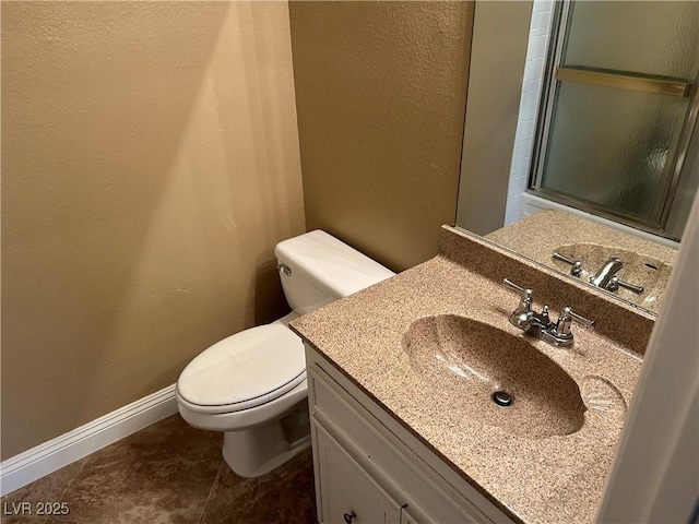608 Watkins Dr, Las Vegas, NV 89107 - bathroom with vanity and a textured wall