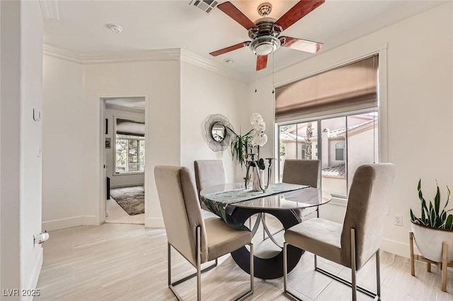 2050 W Warm Springs Rd Unit 3624, Henderson, NV 89014 - dining room with plenty of natural light, a ceiling fan, and crown molding
