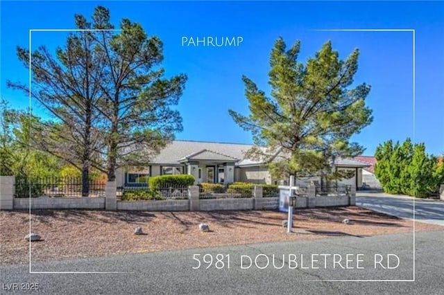 5981 Doubletree Rd, Pahrump, NV 89061 - view of front of house featuring a fenced front yard