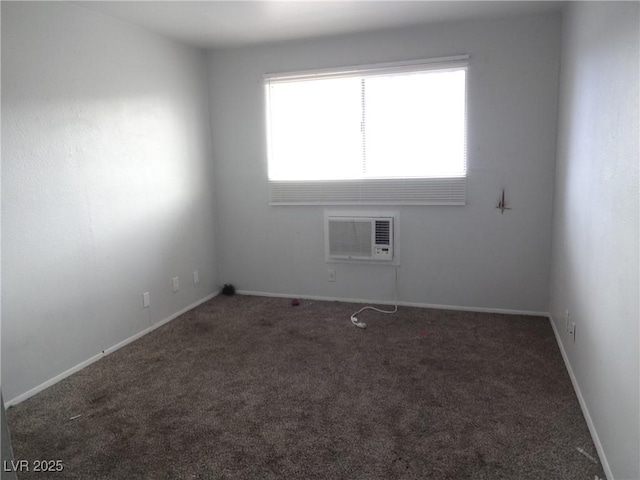 5388 Swenson St Unit 26, Las Vegas, NV 89119 - unfurnished room featuring a wall mounted air conditioner and carpet floors