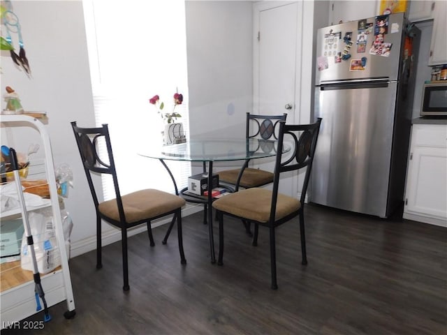 2921 Country Manor Ln Unit 139, Las Vegas, NV 89115 - dining area featuring dark wood-style floors
