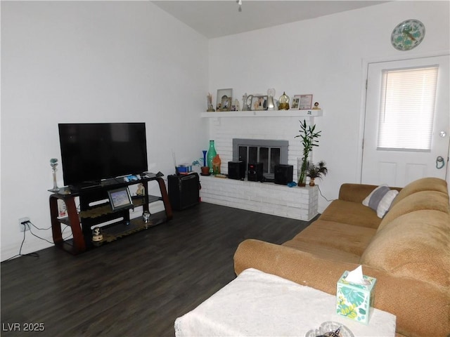 2921 Country Manor Ln Unit 139, Las Vegas, NV 89115 - living room with wood finished floors and a fireplace