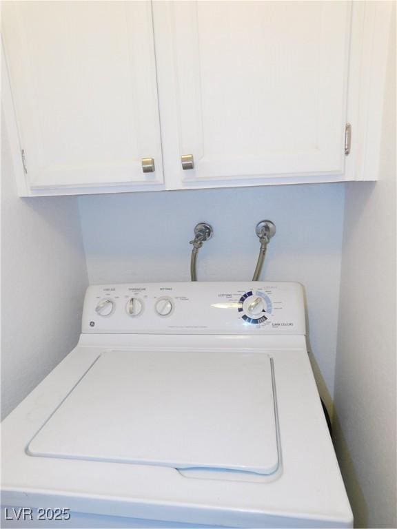 2921 Country Manor Ln Unit 139, Las Vegas, NV 89115 - washroom featuring washer / dryer and cabinet space