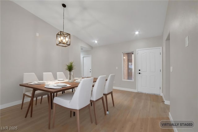 9513 Yucca Blossom Dr, Las Vegas, NV 89134 - dining space featuring light wood-style floors, a chandelier, vaulted ceiling, and recessed lighting