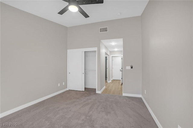 9513 Yucca Blossom Dr, Las Vegas, NV 89134 - unfurnished bedroom featuring carpet flooring, a closet, and ceiling fan