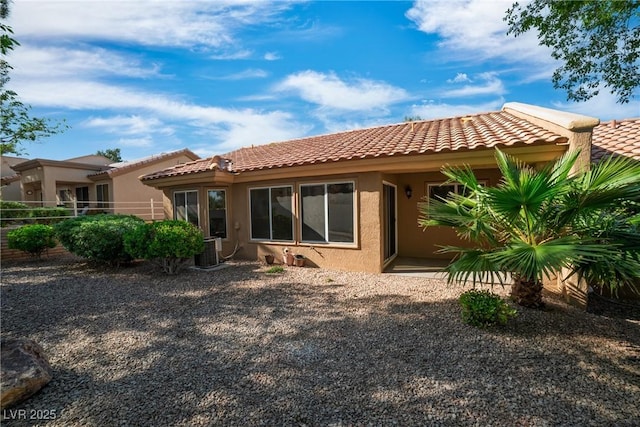 9513 Yucca Blossom Dr, Las Vegas, NV 89134 - back of house featuring stucco siding and a tile roof