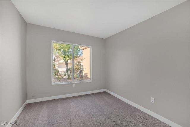 9513 Yucca Blossom Dr, Las Vegas, NV 89134 - carpeted empty room with baseboards