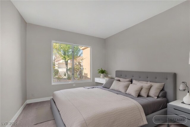 9513 Yucca Blossom Dr, Las Vegas, NV 89134 - bedroom featuring light carpet and baseboards