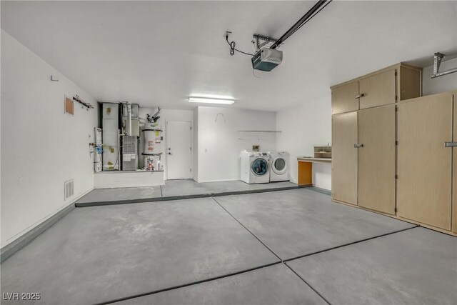 9513 Yucca Blossom Dr, Las Vegas, NV 89134 - garage with water heater, a garage door opener, separate washer and dryer, and heating unit