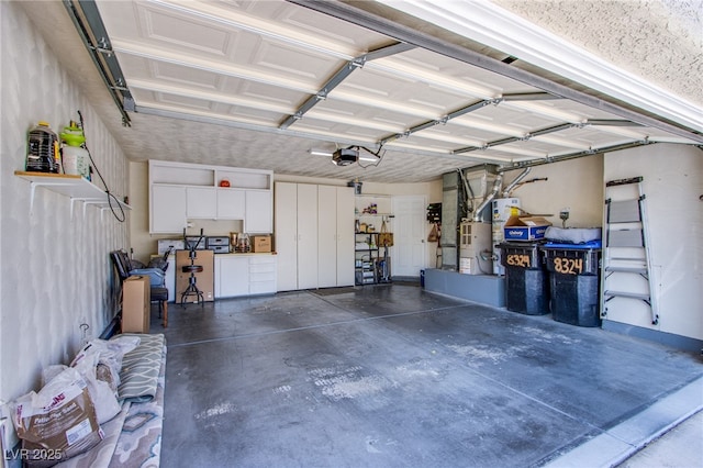 8324 Tide Pool Dr, Las Vegas, NV 89128 - garage featuring water heater, a garage door opener, and heating unit
