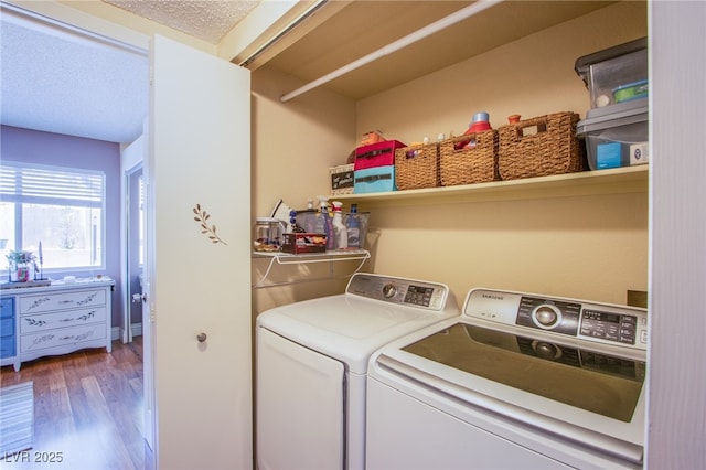 8324 Tide Pool Dr, Las Vegas, NV 89128 - laundry area with independent washer and dryer, wood finished floors, and a textured ceiling