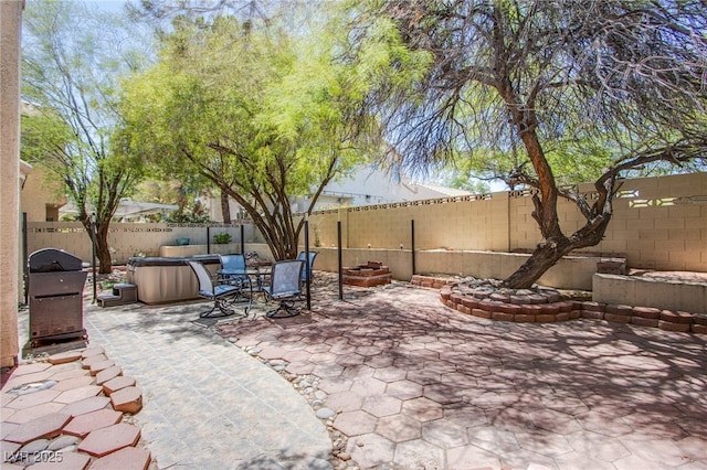 8324 Tide Pool Dr, Las Vegas, NV 89128 - fenced backyard featuring a patio and area for grilling