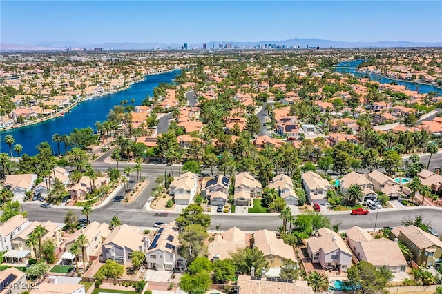 8324 Tide Pool Dr, Las Vegas, NV 89128 - aerial view of residential area with a nearby body of water