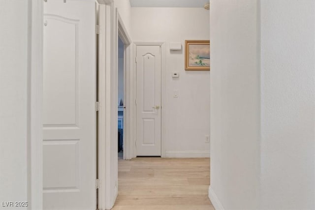 8550 Little Fox St, Las Vegas, NV 89123 - corridor featuring light wood-style flooring and baseboards