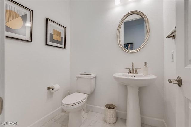 827 Klamath Springs St, Henderson, NV 89011 - half bath featuring marble look tile flooring and baseboards