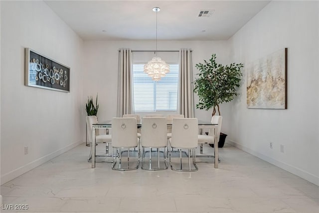 827 Klamath Springs St, Henderson, NV 89011 - dining area featuring marble finish flooring and a chandelier