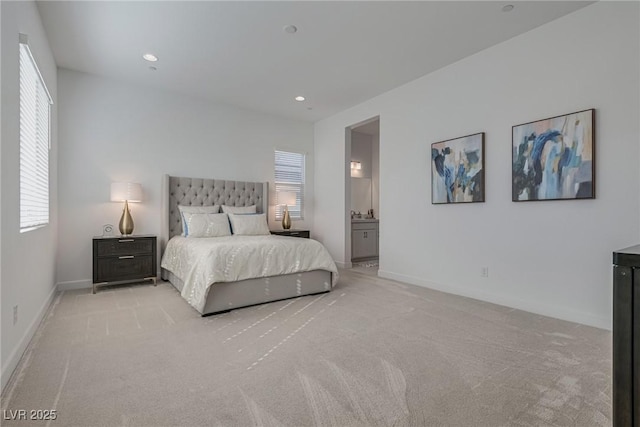827 Klamath Springs St, Henderson, NV 89011 - bedroom with light carpet, multiple windows, recessed lighting, and ensuite bath