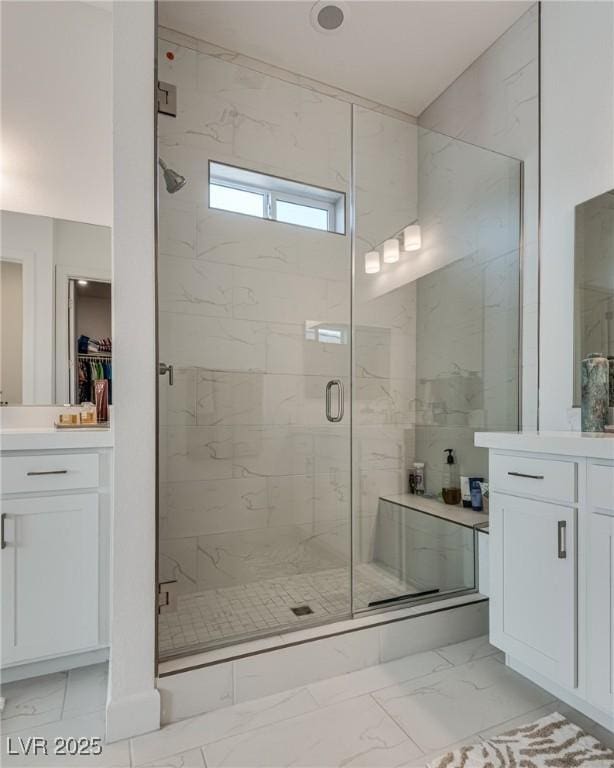 827 Klamath Springs St, Henderson, NV 89011 - full bath with marble look tile flooring, vanity, and a marble finish shower