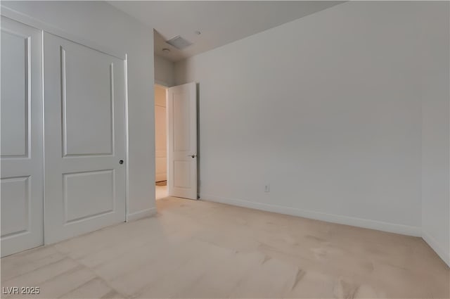 827 Klamath Springs St, Henderson, NV 89011 - unfurnished bedroom featuring light carpet and a closet