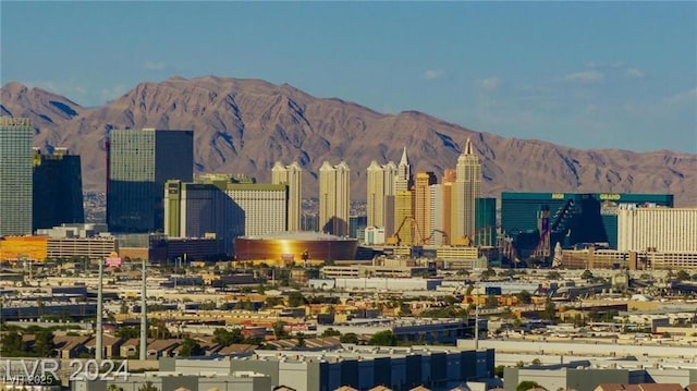 135 E Harmon Ave Unit 2116, Las Vegas, NV 89109 - view of city skyline featuring a mountain backdrop