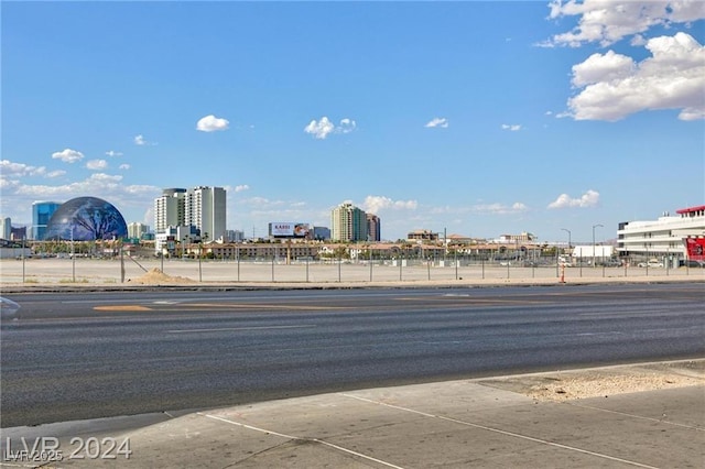 135 E Harmon Ave Unit 2116, Las Vegas, NV 89109 - view of asphalt road with a city view and sidewalks