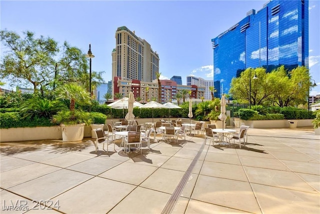 135 E Harmon Ave Unit 2116, Las Vegas, NV 89109 - view of patio / terrace with a view of city