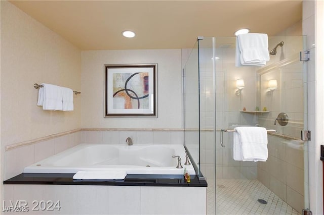 135 E Harmon Ave Unit 2116, Las Vegas, NV 89109 - full bathroom featuring a jetted tub and a stall shower