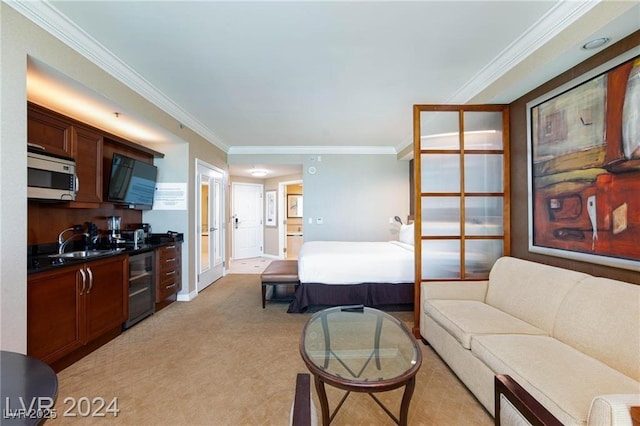 135 E Harmon Ave Unit 2116, Las Vegas, NV 89109 - bedroom featuring beverage cooler, crown molding, and light carpet