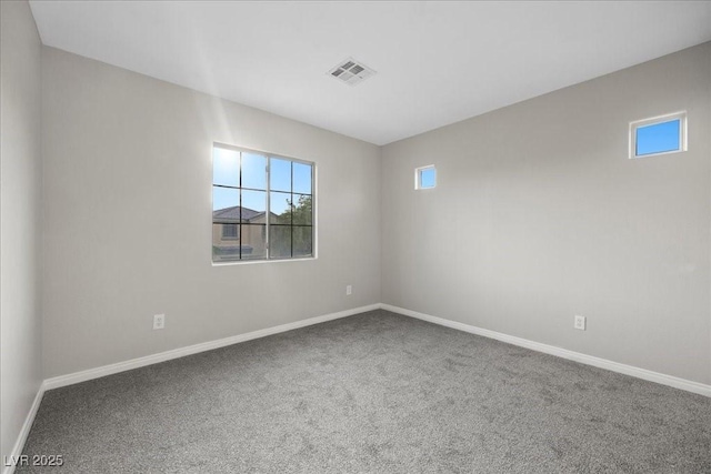 6460 Raven Hall St, North Las Vegas, NV 89084 - carpeted spare room with baseboards