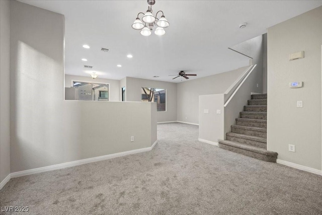 6460 Raven Hall St, North Las Vegas, NV 89084 - unfurnished living room with carpet floors, ceiling fan, stairs, recessed lighting, and a chandelier