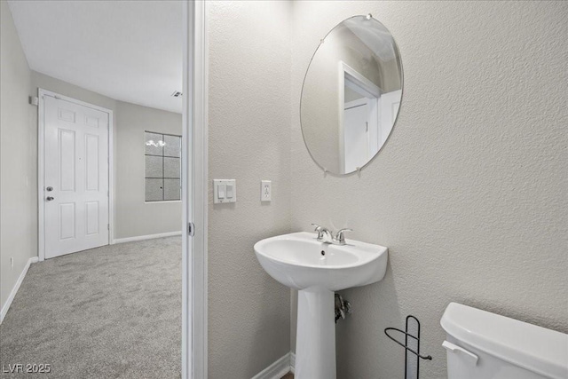 6460 Raven Hall St, North Las Vegas, NV 89084 - bathroom featuring toilet and a sink