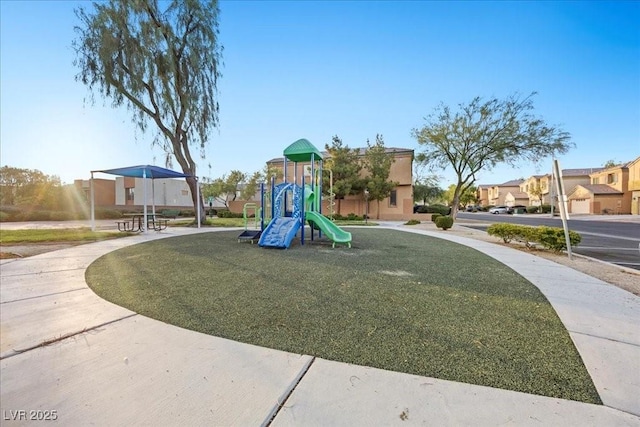 6460 Raven Hall St, North Las Vegas, NV 89084 - community jungle gym with a lawn and a residential view