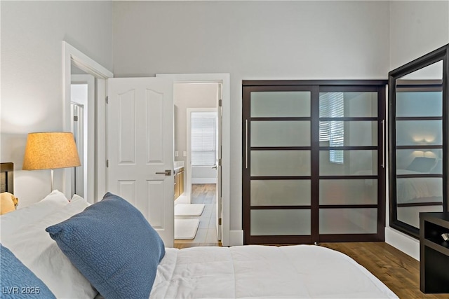 1509 Winslow St, Las Vegas, NV 89117 - bedroom with wood finished floors and baseboards