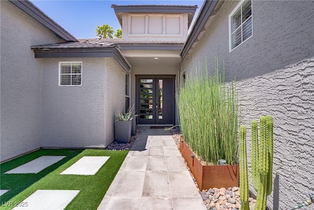 1509 Winslow St, Las Vegas, NV 89117 - view of exterior entry with stucco siding and french doors