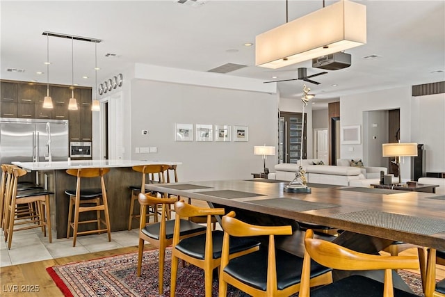 1509 Winslow St, Las Vegas, NV 89117 - dining room with recessed lighting and light wood-style floors