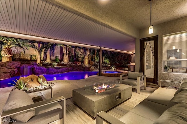 1509 Winslow St, Las Vegas, NV 89117 - view of patio with an outdoor living space with a fire pit and an outdoor pool