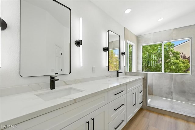 2105 Madagascar Ln, Las Vegas, NV 89117 - full bathroom featuring double vanity, lofted ceiling, wood finished floors, and recessed lighting