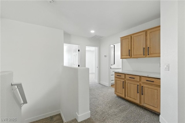 2105 Madagascar Ln, Las Vegas, NV 89117 - kitchen featuring light colored carpet, light countertops, and recessed lighting