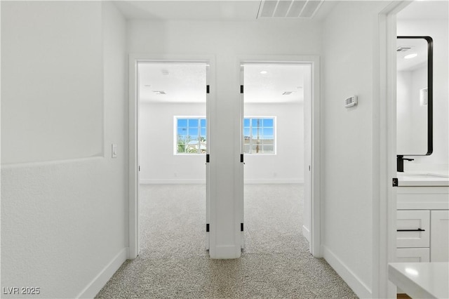 2105 Madagascar Ln, Las Vegas, NV 89117 - hallway featuring carpet