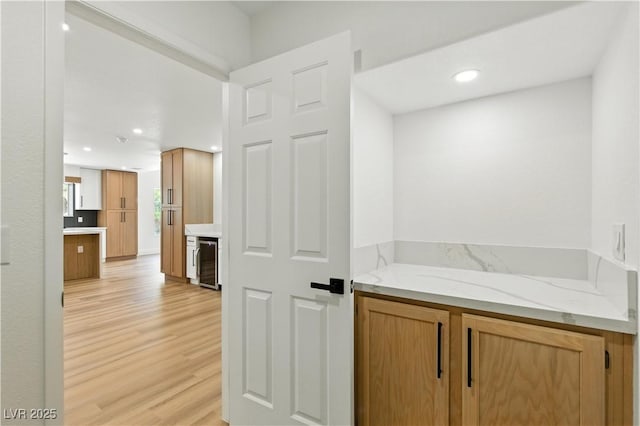 2105 Madagascar Ln, Las Vegas, NV 89117 - bathroom featuring wine cooler, wood finished floors, recessed lighting, and vanity