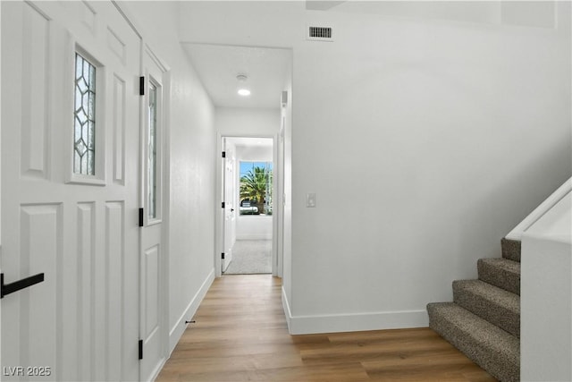 2105 Madagascar Ln, Las Vegas, NV 89117 - corridor with light wood-type flooring and stairs