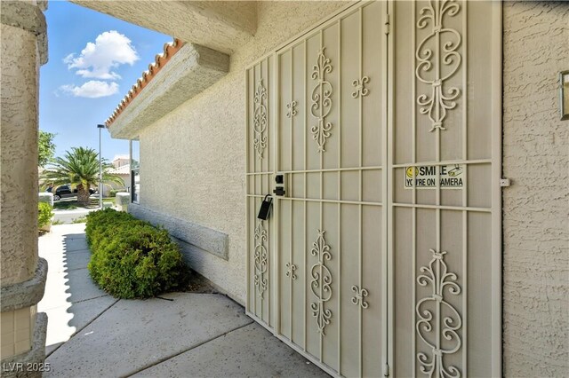 2105 Madagascar Ln, Las Vegas, NV 89117 - property entrance featuring stucco siding